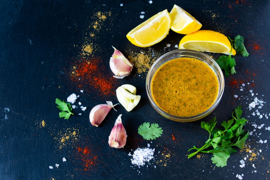 Artful display of the ingredients needed to make chermoula, a North African herb-based condiment